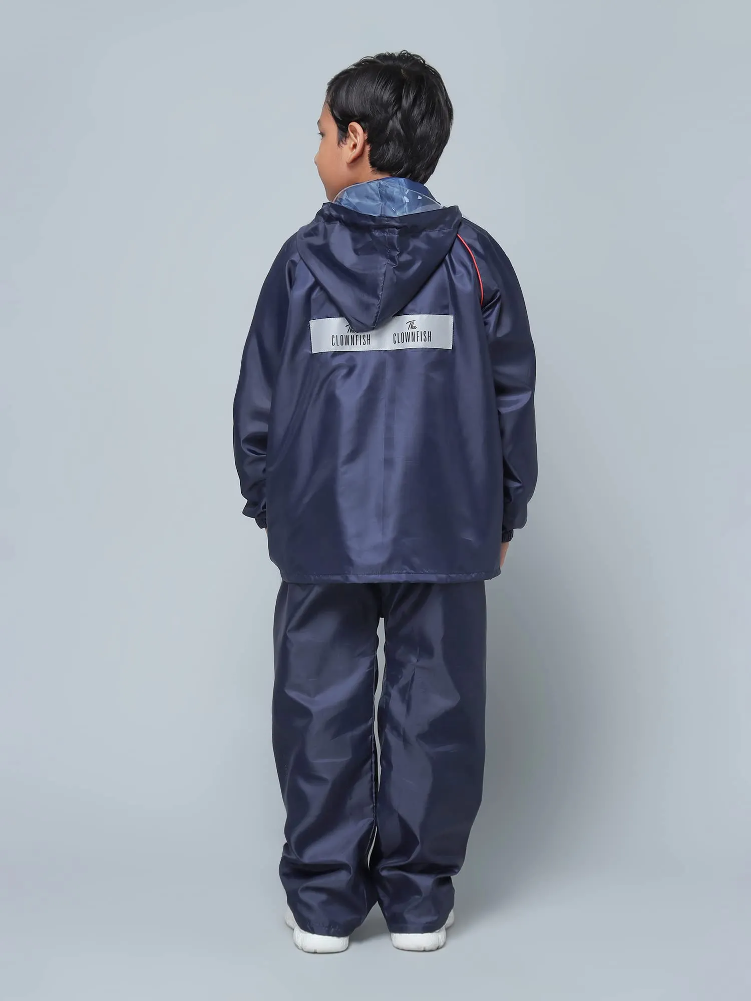 THE CLOWNFISH Duke Series Kid's Waterproof Polyester Double Coating Reversible Standard Length Raincoat With Hood And Reflector At Back Set Of Top And Bottom Printed Plastic Pouch Age-5-7 Years(Blue)