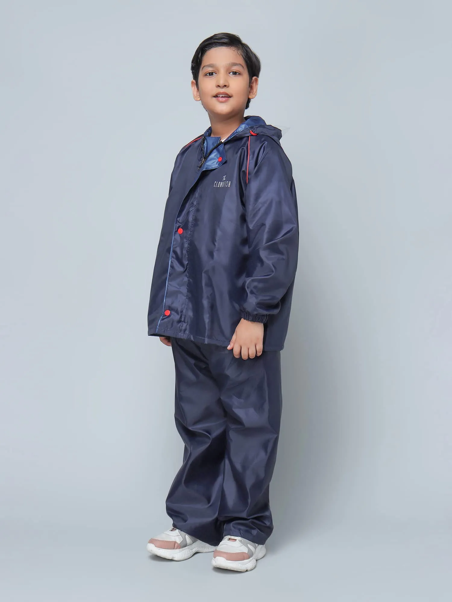 THE CLOWNFISH Duke Series Kid's Waterproof Polyester Double Coating Reversible Standard Length Raincoat With Hood And Reflector At Back Set Of Top And Bottom Printed Plastic Pouch Age-5-7 Years(Blue)